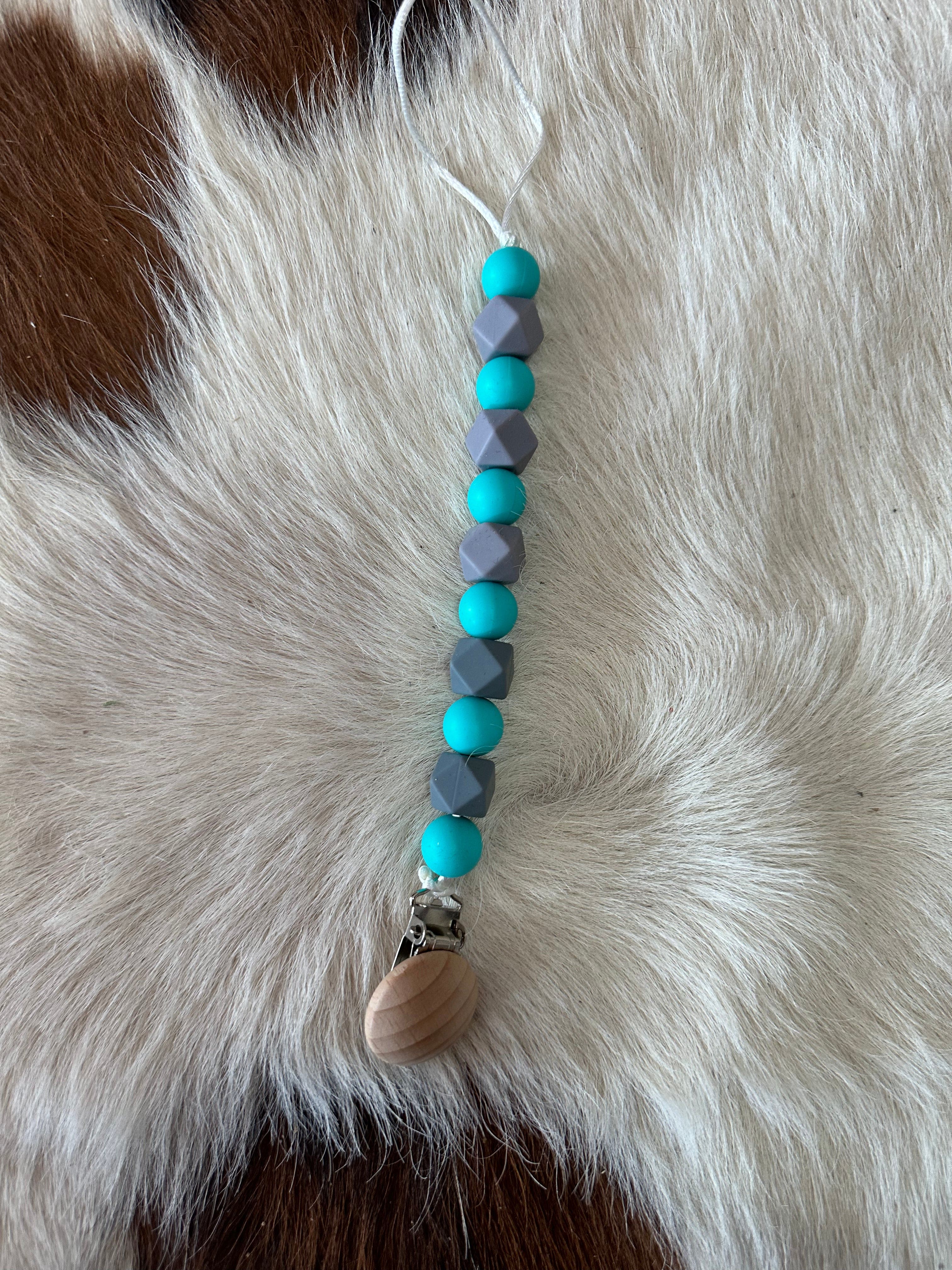 Pacifier Clips Cowpuncher Babe Color: Turquoise and gray
