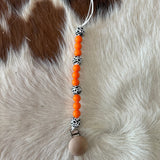 Pacifier Clips Cowpuncher Babe Color: Orange and cow print