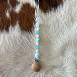 Pacifier Clips Cowpuncher Babe Color: Light blue and tan