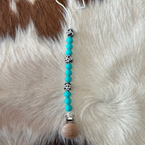 Pacifier Clips Cowpuncher Babe Color: Turquoise and cow print